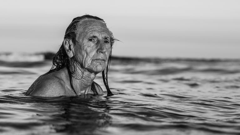 elderly man in water